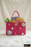 Pink children's bag with animal faces and toys