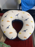 U-shaped pillow with dinosaur pattern