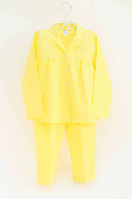Shop bright yellow 100% cotton nightwear for girls, offering softness and comfort for a restful night's sleep.