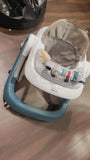 BABYHUG baby walker with sturdy frame, padded seat, and toy tray for safe first steps.