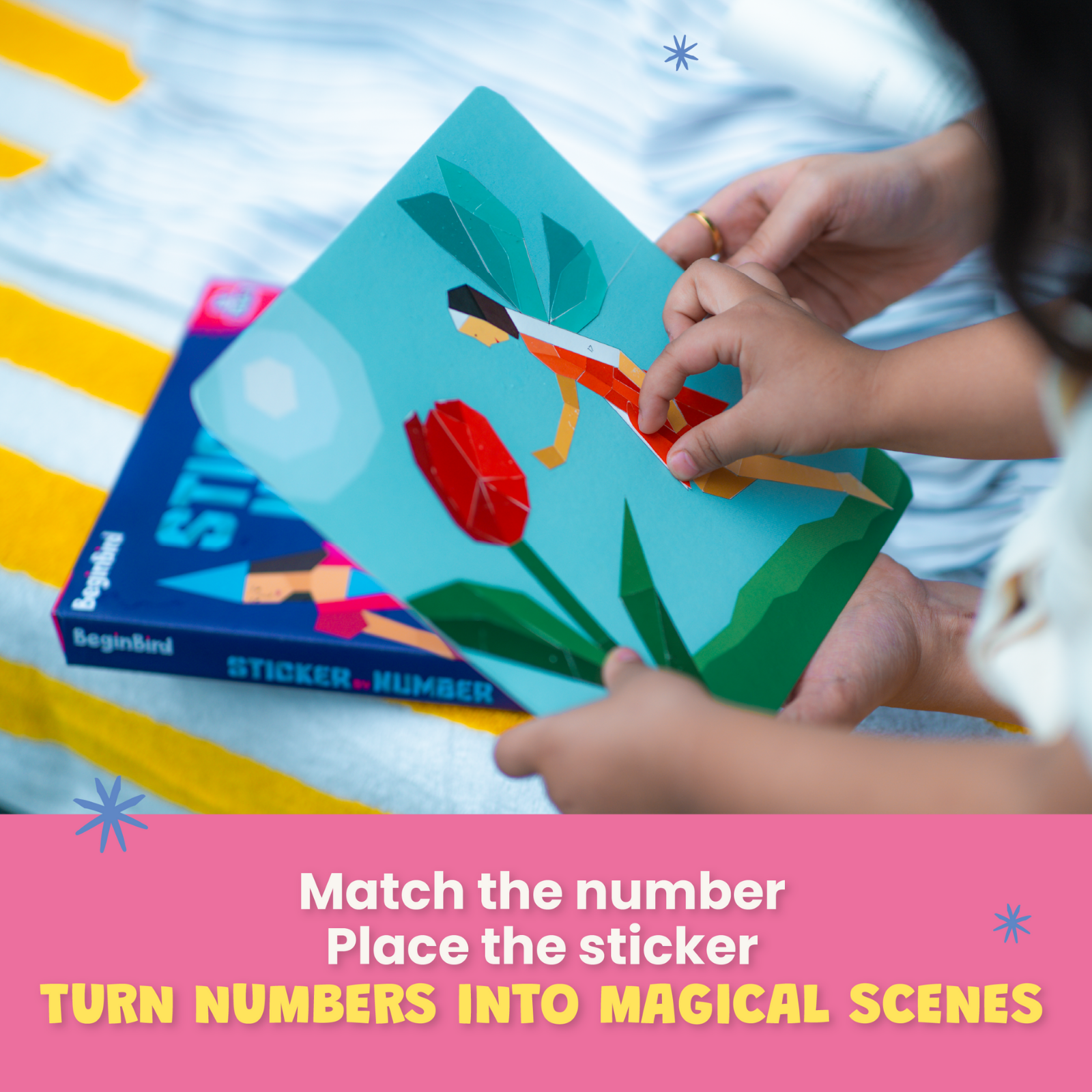 Children's book with stickers held by a child, on a colorful background.