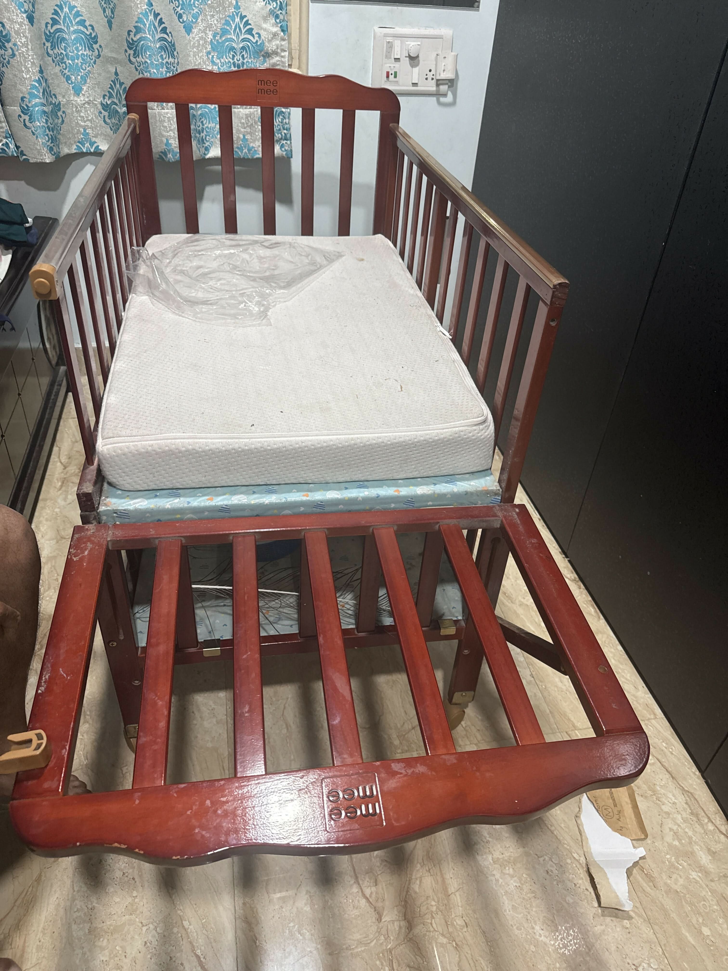 Safe and durable crib/cot for babies, offering comfort, stability, and style for a restful nursery environment.