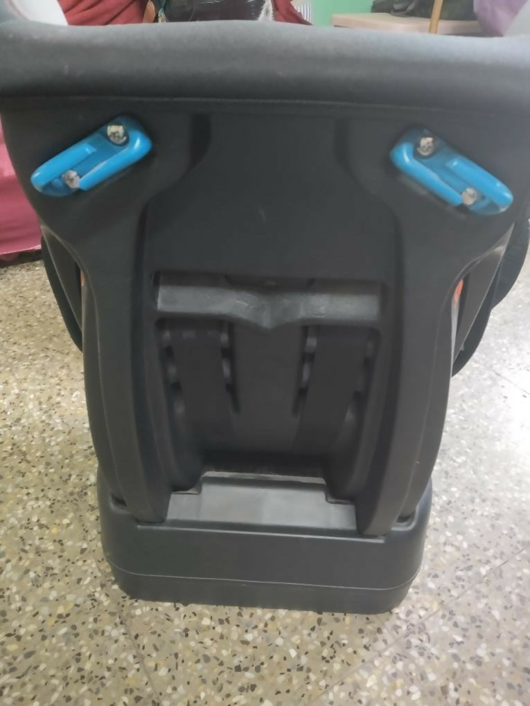 Black and blue tool case on a speckled surface