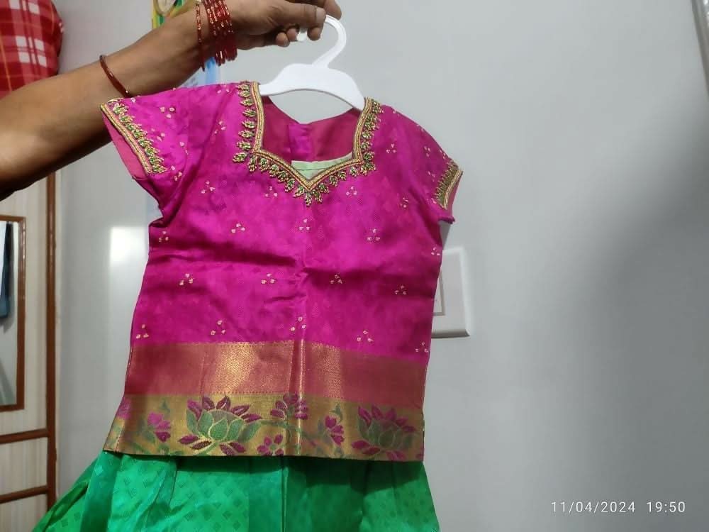 Dress your little girl in luxury and elegance with our Silk Lehenga and Blouse set, perfect for special occasions and celebrations.
