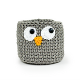 This adorable handmade crochet basket, crafted by skilled women artisans, brings the lovable yellow characters to life while adding playful functionality to your home.