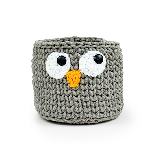 This adorable handmade crochet basket, crafted by skilled women artisans, brings the lovable yellow characters to life while adding playful functionality to your home.