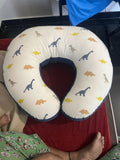 U-shaped pillow with dinosaur patterns