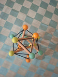 Curious cub geometric rattle ball toy