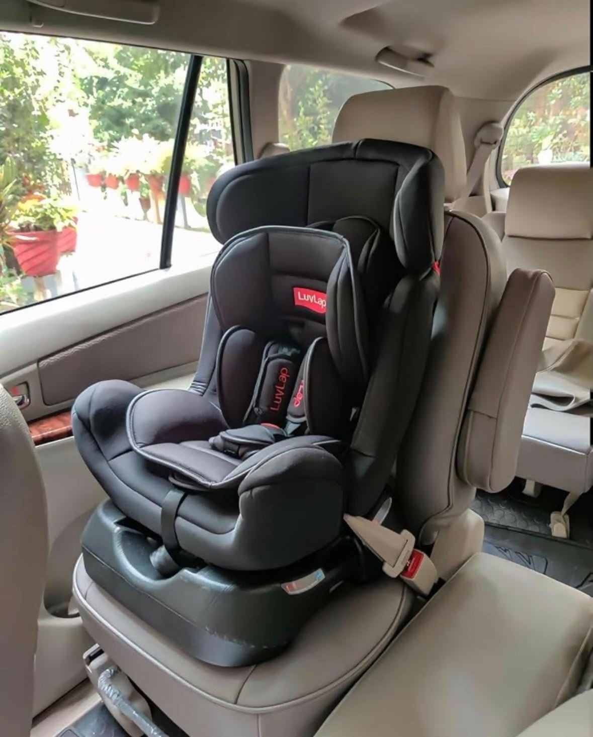 LuvLap Galaxy Convertible Car Seat with rear and forward-facing modes, 5-point safety harness, side-impact protection, adjustable headrest, and cushioned seating for growing children.