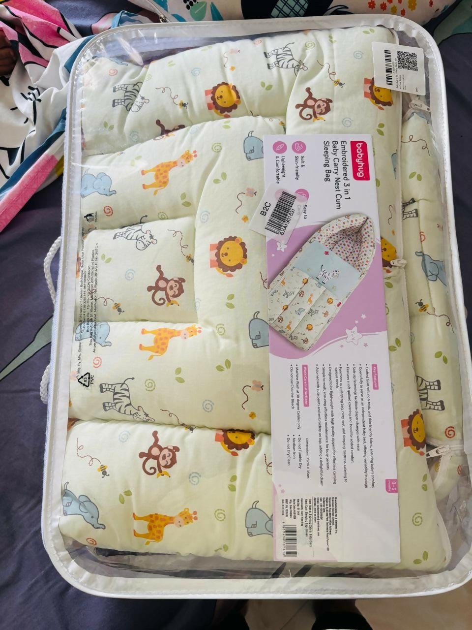 BABYHUG Baby Carry Nest Cum Sleeping Bag with soft padded cushioning, secure carry handles, zip closure, and cozy design to keep newborns warm, comfortable, and supported during travel and naps.