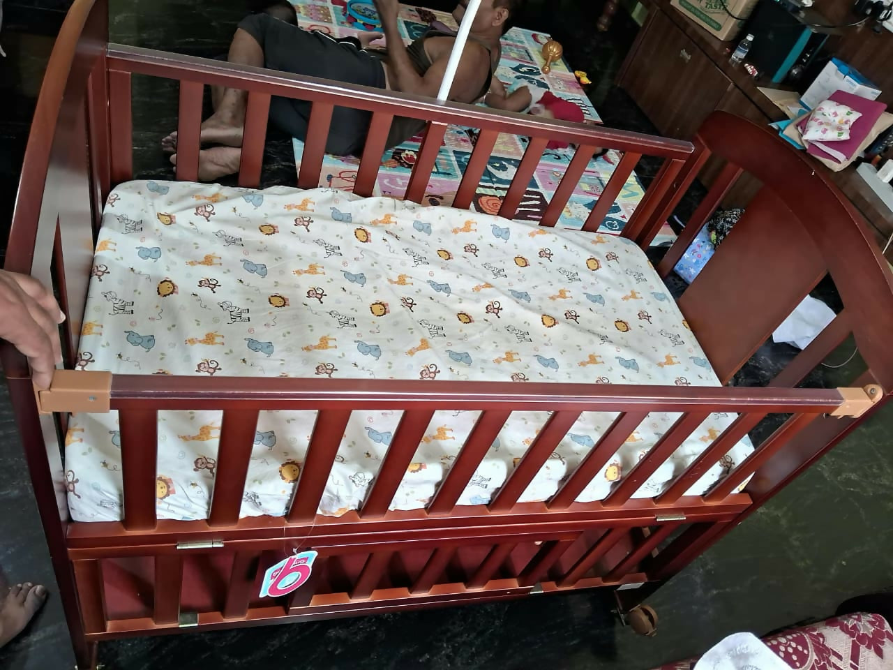 BABYHUG Florence 3 in 1 Rocking Cot/Crib Cum Junior Bed in Cherry finish featuring a versatile convertible design, rocking function, protective side rails, and spacious sleeping area that adapts as your child grows.