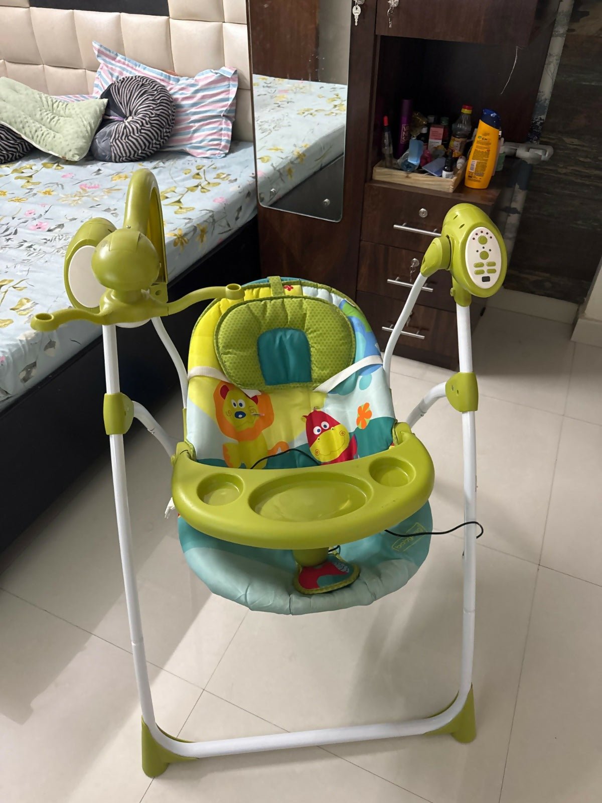 BABYHUG Gaiety electronic swing with soothing swinging motion, cushioned seat, safety harness, and comfortable design to help babies relax, rest, and enjoy gentle movement