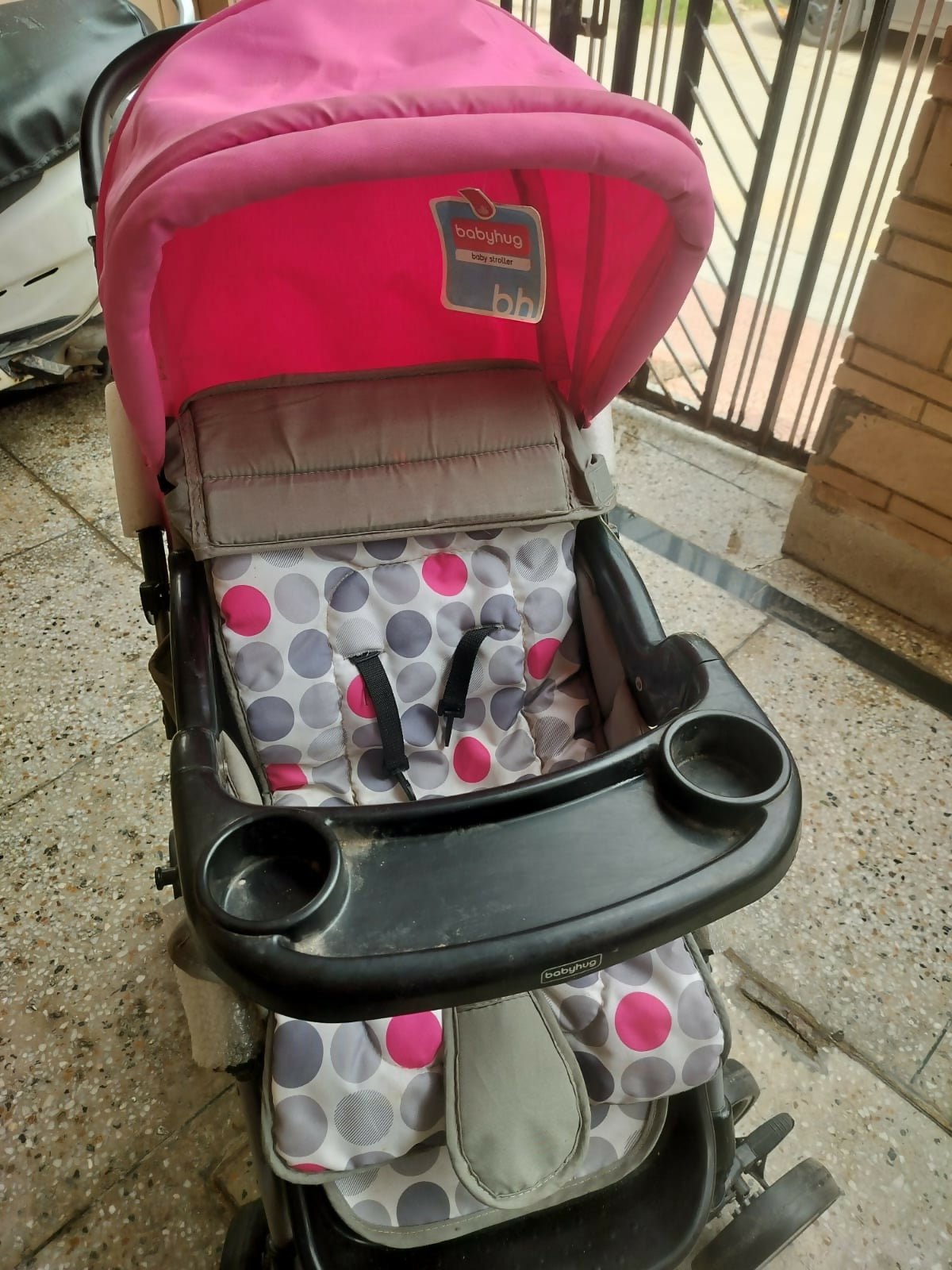 BABYHUG stroller/pram with a lightweight foldable design, reclining seat, adjustable canopy, 5-point safety harness, smooth-rolling wheels, and a spacious storage basket for safe and comfortable travel with babies and toddlers.