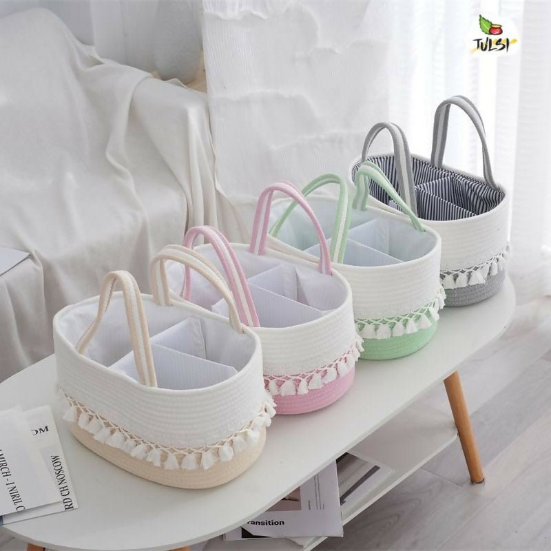 Baby diaper caddy bag with multiple storage compartments, cute design, organized sections, sturdy handles, and convenient storage for diapers, wipes, bottles, and baby essentials.