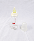 Pigeon 120ml Glass Feeding Bottle with Peristaltic silicone nipple, BPA-free glass, ergonomic shape, and durable design for safe, comfortable, and natural feeding for newborns and infants.