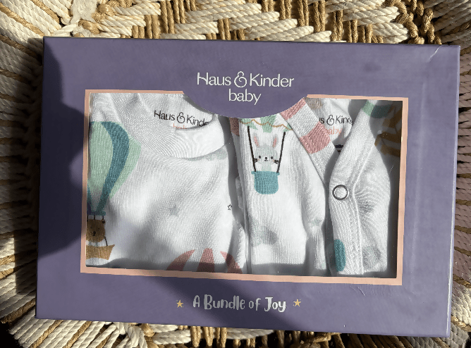 haus & kinder 3-piece printed pure cotton baby apparel gift set featuring soft breathable cotton clothing, coordinated prints, and a comfortable outfit for newborns and babies.