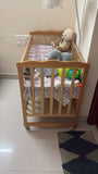 BABYHUG Montana Cot/Crib with Mattress featuring a sturdy design, protective side rails and comfortable mattress, creating a practical and cozy sleeping space for babies at home.