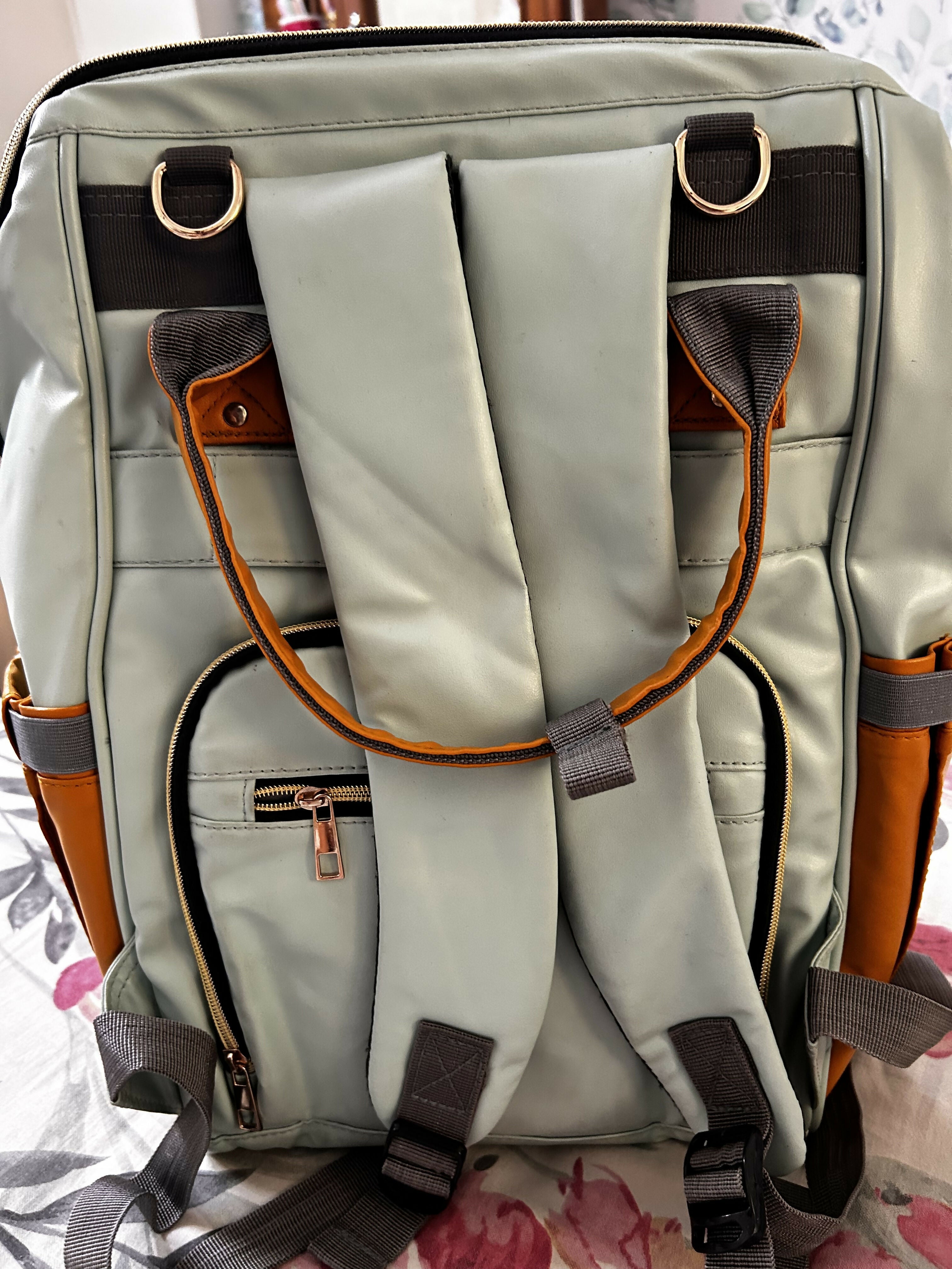 STARANDDAISY diaper bag for mothers with spacious compartments, multiple storage pockets, comfortable carrying straps, and organized space for baby essentials during travel and outings.