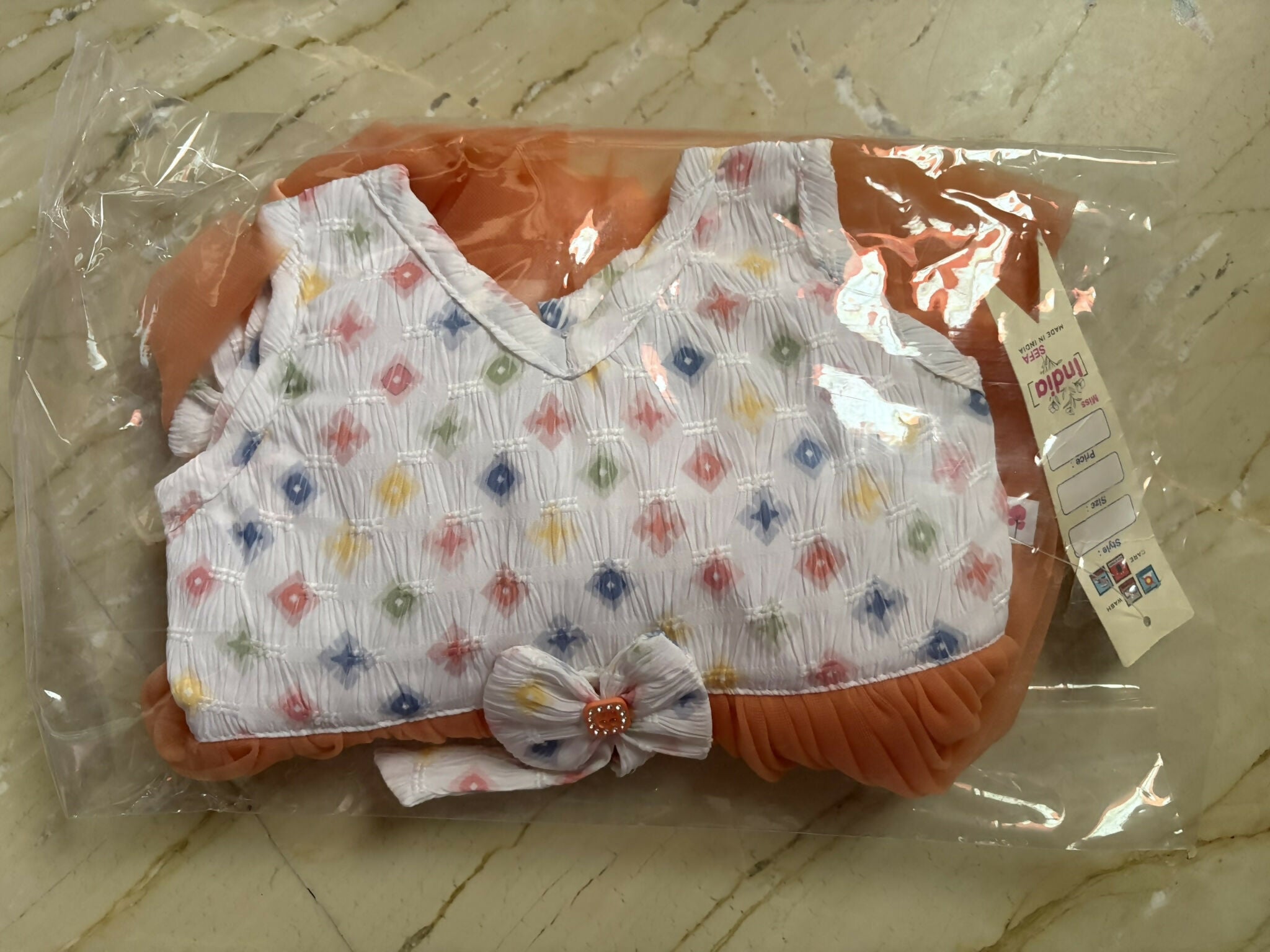 Brand new baby girl orange dress frock featuring soft comfortable fabric, charming design, and a comfortable fit for everyday wear, birthdays, and special occasions.