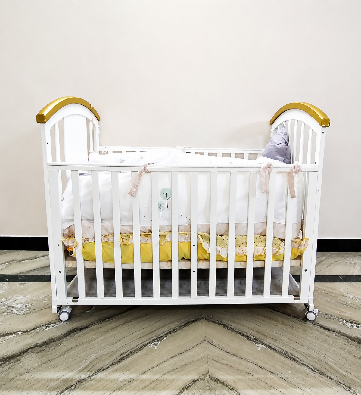 HunyHuny Wooden Baby Cot Crib B102 with rocking function, lockable wheels, included mattress, spacious sleeping area, and a sturdy wooden frame for safe and comfortable sleep.