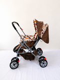 BABYHUG Cosy Cosmo baby stroller with reclining seat, foldable pram design, safety harness, smooth wheels, adjustable canopy, and comfortable travel support from newborn to tod