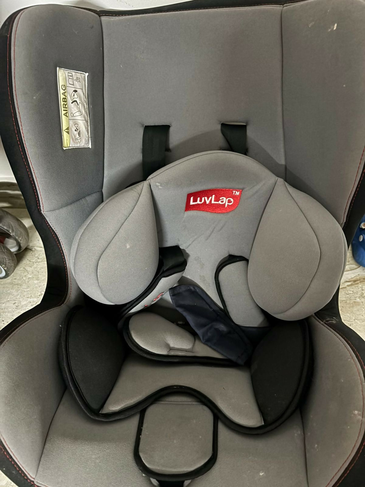 LuvLap Galaxy convertible car seat with rear and forward-facing modes, adjustable headrest, 5-point safety harness, side-impact protection, and cushioned comfort for infants and growing children.