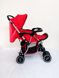 Babyhug 2-in-1 Rock and Roll stroller with rocker mode, reversible handle, reclining seat, 5-point safety harness, adjustable canopy, and smooth wheels for comfortable rides.