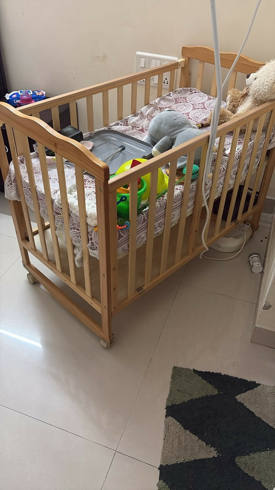 BABYHUG Montana Cot/Crib with Mattress featuring a sturdy design, protective side rails and comfortable mattress, creating a practical and cozy sleeping space for babies at home.
