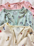 Buy NEXT Baby Sleep Suits – Pack of 3 super soft cotton onesies with 2-way zippers and built-in mitts for all-night comfort.