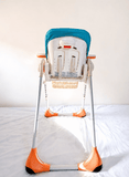 Chicco Polly foldable baby high chair with reclining feeding seat, adjustable tray, cushioned seating, sturdy frame, and premium design for comfortable baby mealtime and feeding.