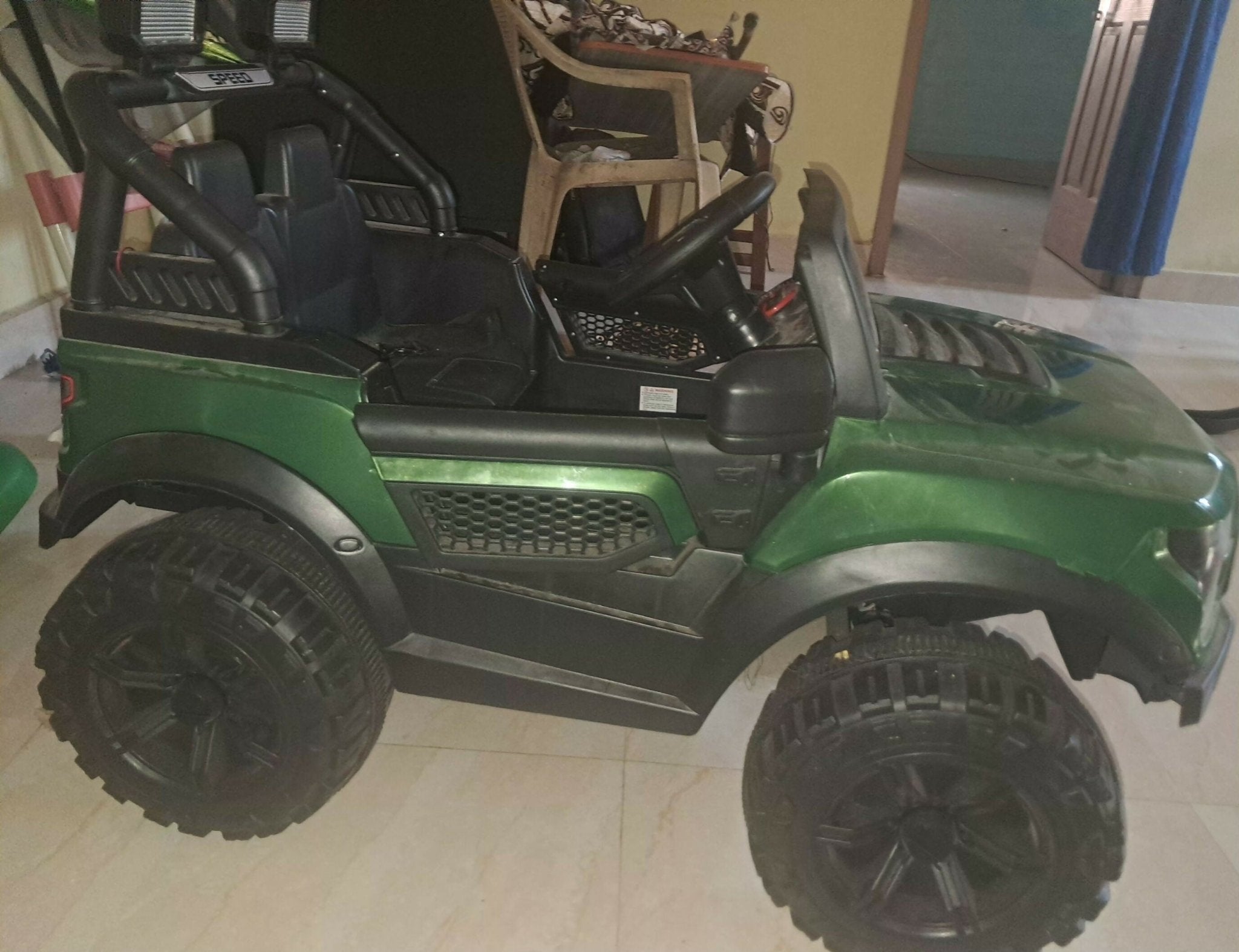 Kids ride-on toy with a sturdy design, comfortable seat, easy-grip steering, smooth wheels, and durable construction for safe indoor and outdoor play.