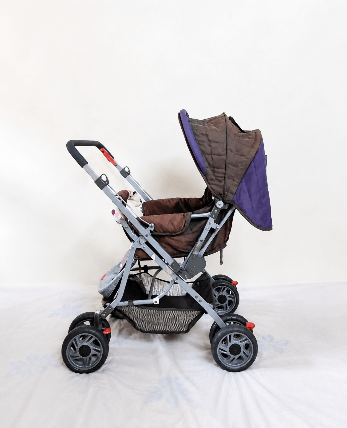LUVLAP Sunshine reversible handle stroller with reclining seat, foldable baby pram design, safety harness, adjustable canopy, and comfortable travel support for babies and toddlers.