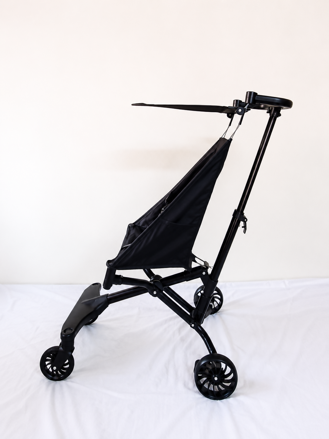 Alalica YBL-16 Lightweight Baby Stroller B123 weighing 3.5 kg with a compact foldable design, comfortable seat, protective canopy, safety harness, and smooth wheels for convenient everyday travel.