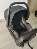 Evenflo travel system with baby stroller and infant car seat, featuring a foldable design, reclining seat, adjustable canopy, 5-point safety harness, and spacious storage basket for convenient travel.