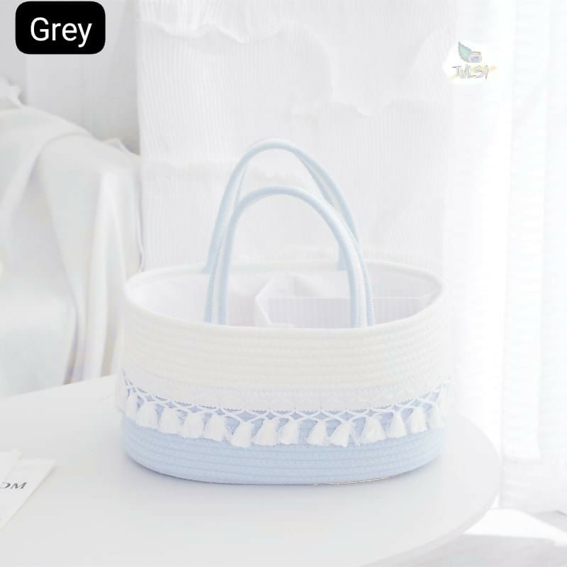Baby diaper caddy bag with multiple storage compartments, cute design, organized sections, sturdy handles, and convenient storage for diapers, wipes, bottles, and baby essentials.