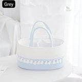 Baby diaper caddy bag with multiple storage compartments, cute design, organized sections, sturdy handles, and convenient storage for diapers, wipes, bottles, and baby essentials.