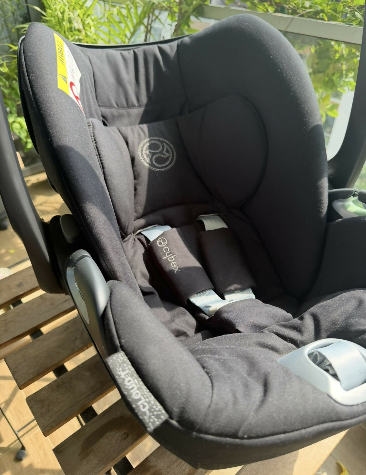 Cybex Cloud T Infant Car Seat with ergonomic reclining design, padded infant support, adjustable headrest, safety harness, side-impact protection, and comfortable seating for secure newborn and infant travel.