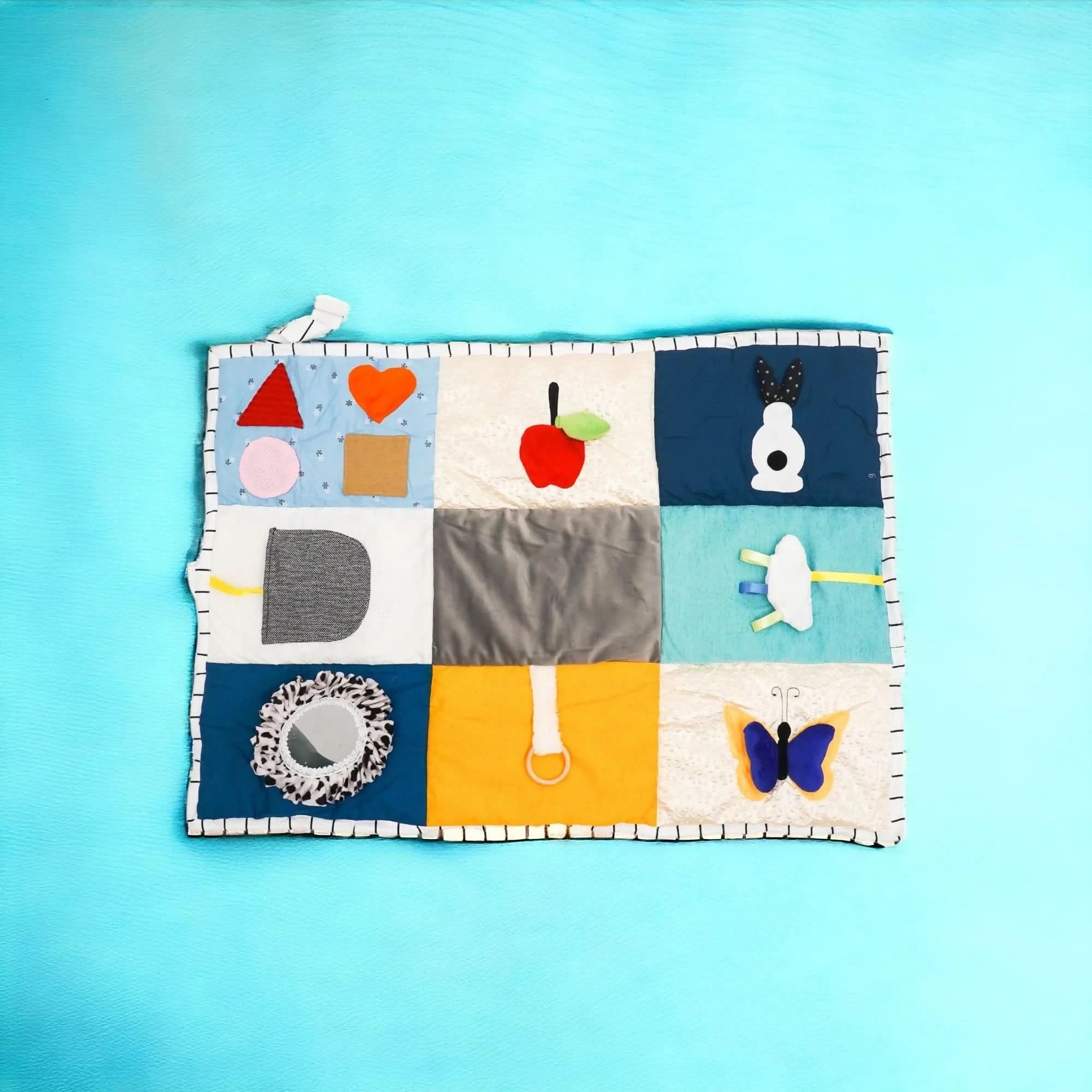 Shop now for the B4BRAIN Sensory PlayMat + Tummy Time Mirror, offering vibrant textures, a shatterproof mirror, and a safe, cozy play area to boost your baby's sensory development and strength!
