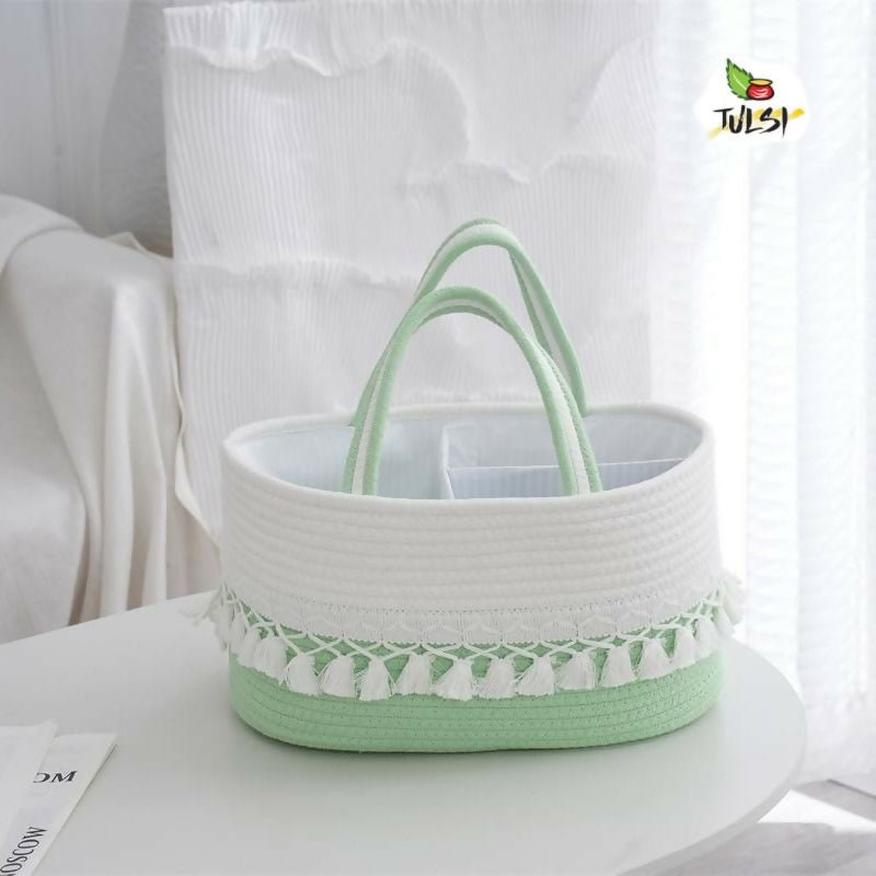 Baby diaper caddy bag with multiple storage compartments, cute design, organized sections, sturdy handles, and convenient storage for diapers, wipes, bottles, and baby essentials.