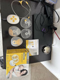 Medela Duo Wearable Electric Breast Pump with a hands-free in-bra design, adjustable suction levels, rechargeable battery, and soft breast shields for comfortable and efficient milk expression.
