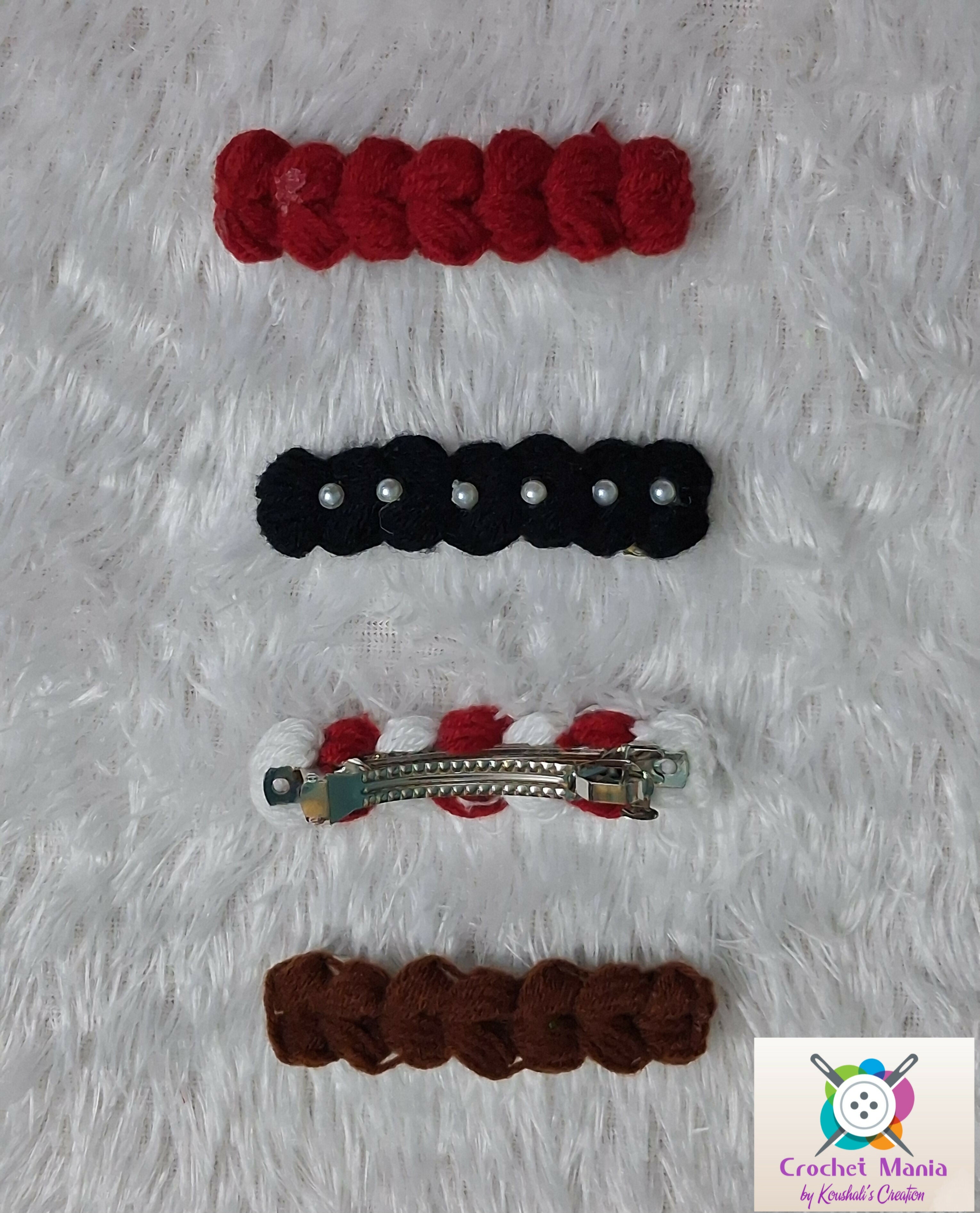 Set of crochet hair clips in red, black, and brown