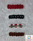 Set of crochet hair clips in red, black, and brown
