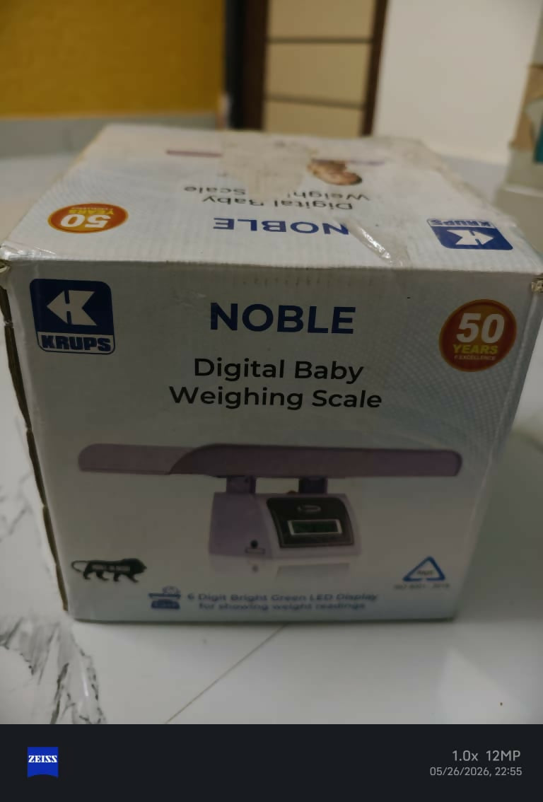 KRUPS Noble digital baby weighing scale with accurate weight measurement, easy-to-read display, stable platform, and convenient monitoring for infants and growing babies.