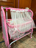 Fab N Funky Manual Cradle with a sturdy frame, gentle manual rocking motion, comfortable sleeping area, breathable design, and secure construction to provide a cozy resting space for newborns and infants.