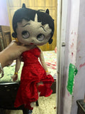 Fashion doll soft toy in a red dress with soft plush fabric, charming design, cuddly feel, and child-friendly construction for playtime, gifting, and companionship.