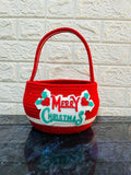 Red woven basket with 'Merry Christmas'