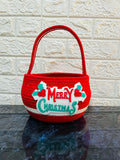 Red woven basket with 'Merry Christmas'