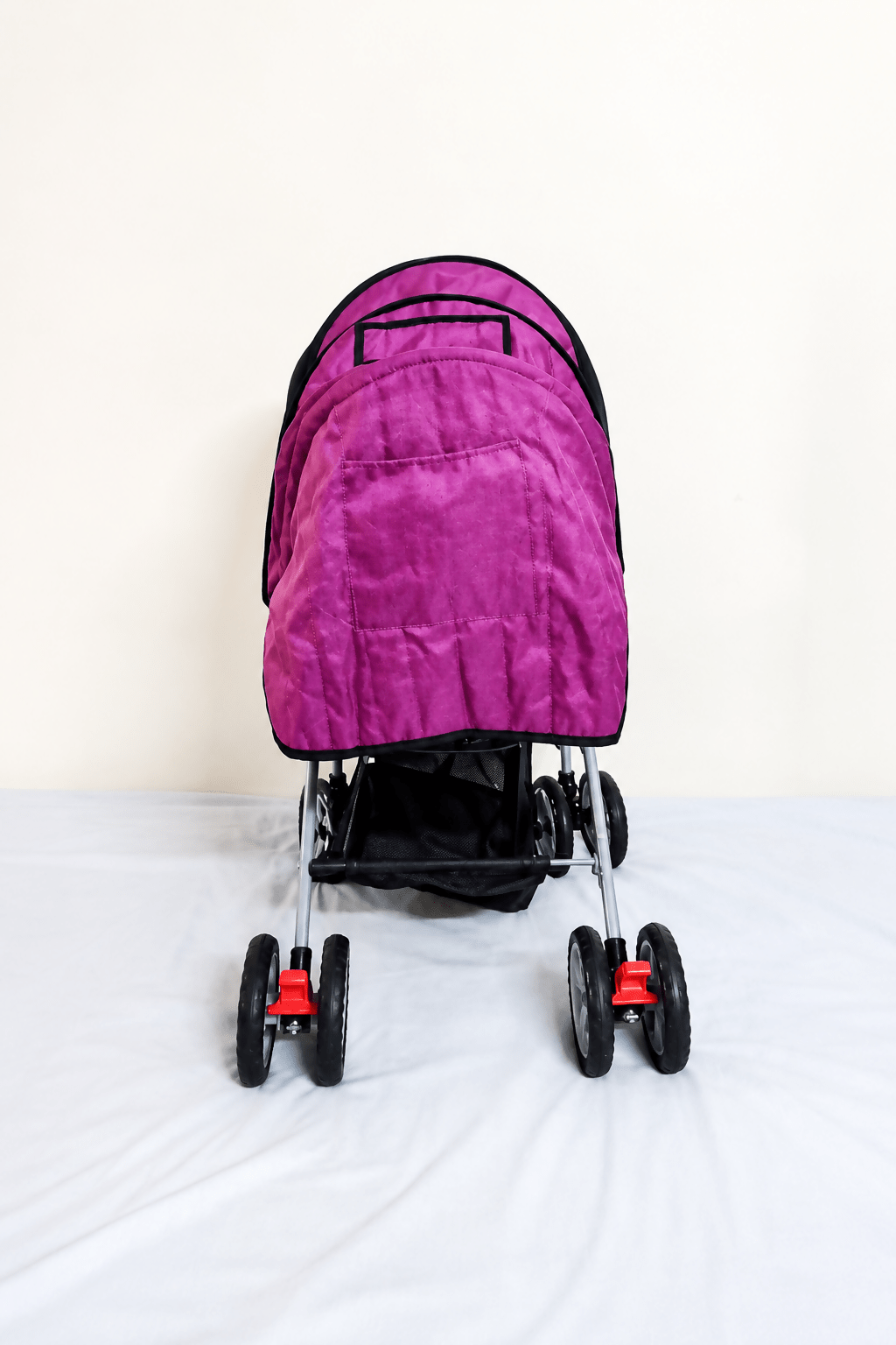 Tiffy & Toffee Maxtrem baby stroller with reversible handle, reclining seat, foldable travel pram design, adjustable canopy, 5-point safety harness, smooth wheels, and storage basket for babies and toddlers up to 22 kg.