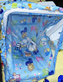 Children's playpen with cartoon animal patterns on a blue background