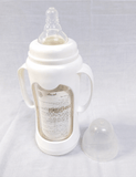 Giggles 210ml Glass Feeding Bottle with dual handles, BPA-free glass, soft silicone nipple, and ergonomic design for comfortable, safe, and easy feeding for babies learning to hold a bottle.